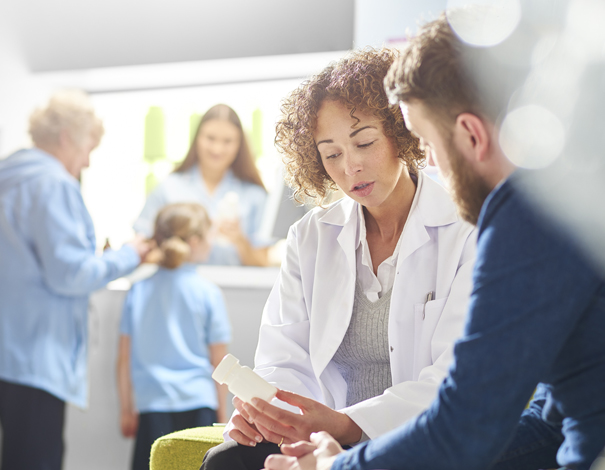 Pharmacist helping patient with allergy medication