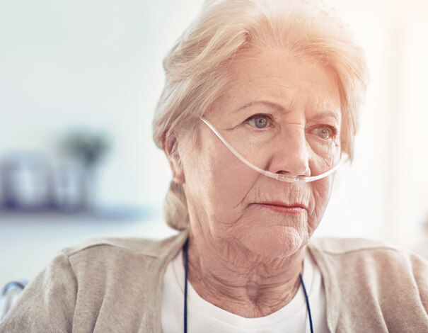 woman with an oxygen tube